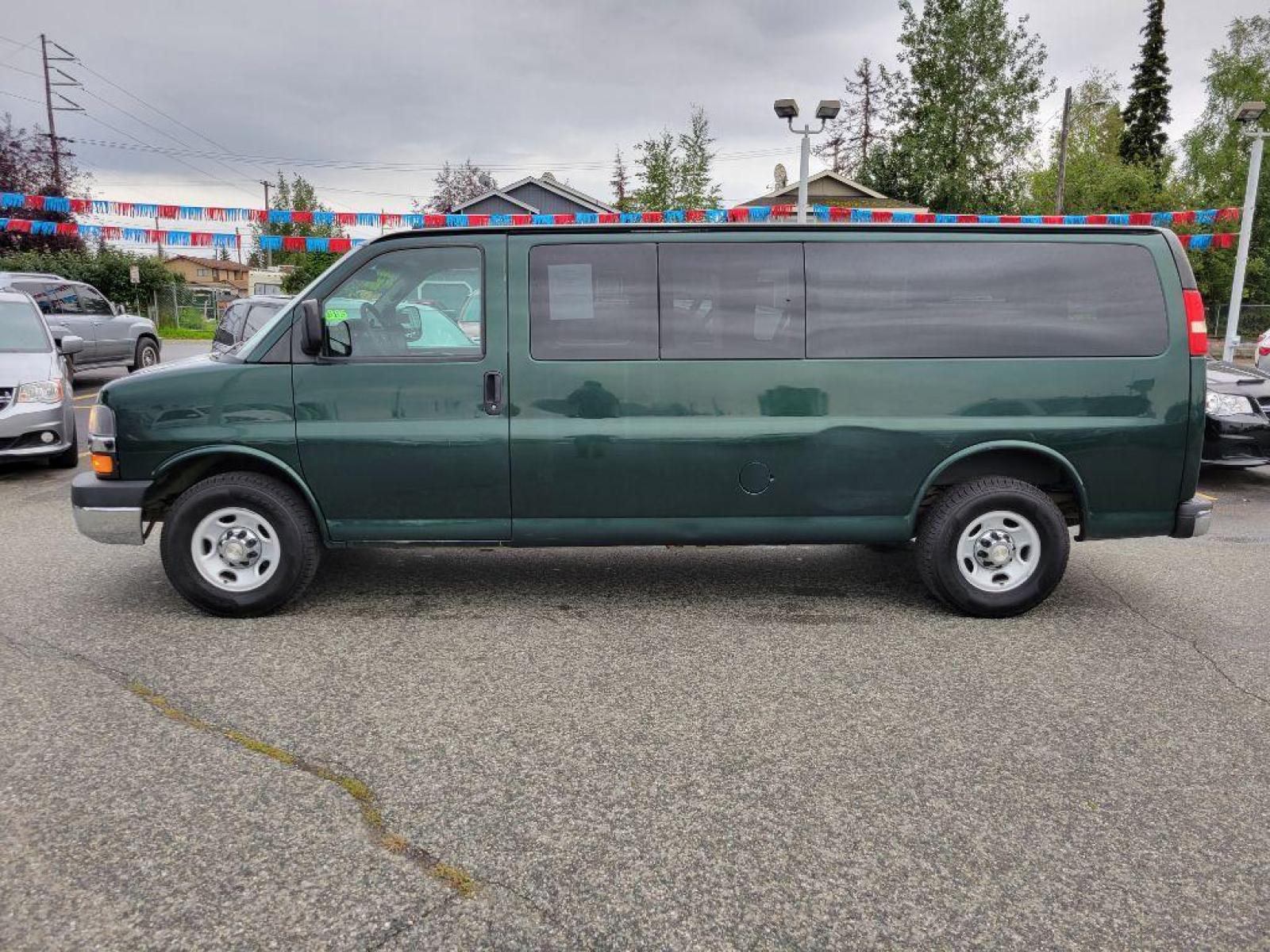 2014 GREEN CHEVROLET EXPRESS G3500 LT (1GAZG1FG8E1) with an 6.0L engine, Automatic transmission, located at 929 East 8th Ave, Anchorage, 99501, (907) 274-2277, 61.214783, -149.866074 - Photo #1