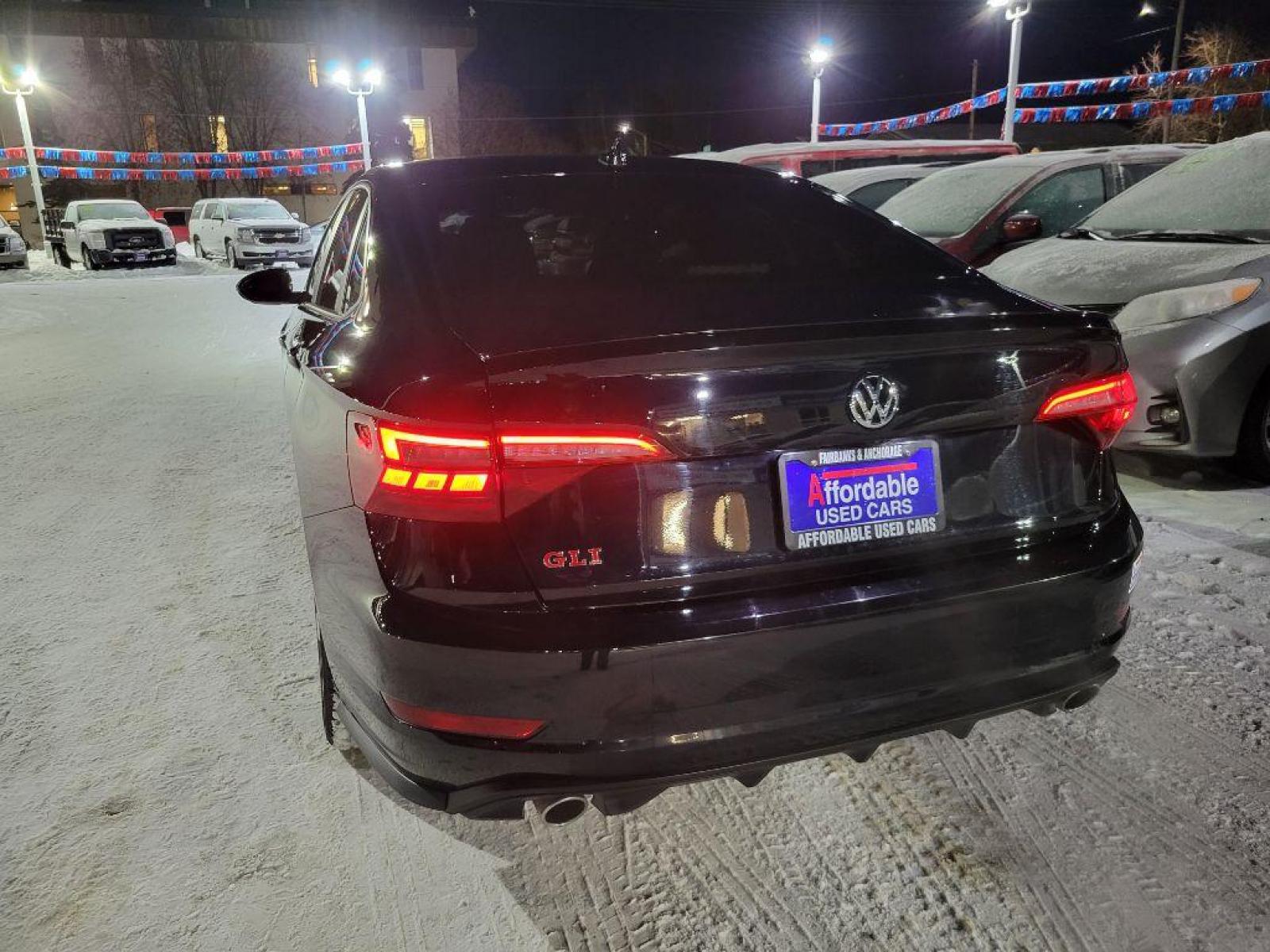 2021 BLACK VOLKSWAGEN JETTA GLI (3VW5T7BU9MM) with an 2.0L engine, 8-Speed Manual transmission, located at 929 East 8th Ave, Anchorage, 99501, (907) 274-2277, 61.214783, -149.866074 - Photo #2