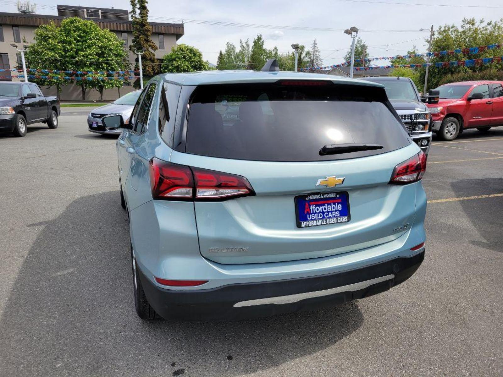 2022 TEAL CHEVROLET EQUINOX LT (2GNAXUEVXN6) with an 1.5L engine, Automatic transmission, located at 929 East 8th Ave, Anchorage, AK, 99501, (907) 274-2277, 61.214783, -149.866074 - Photo #2