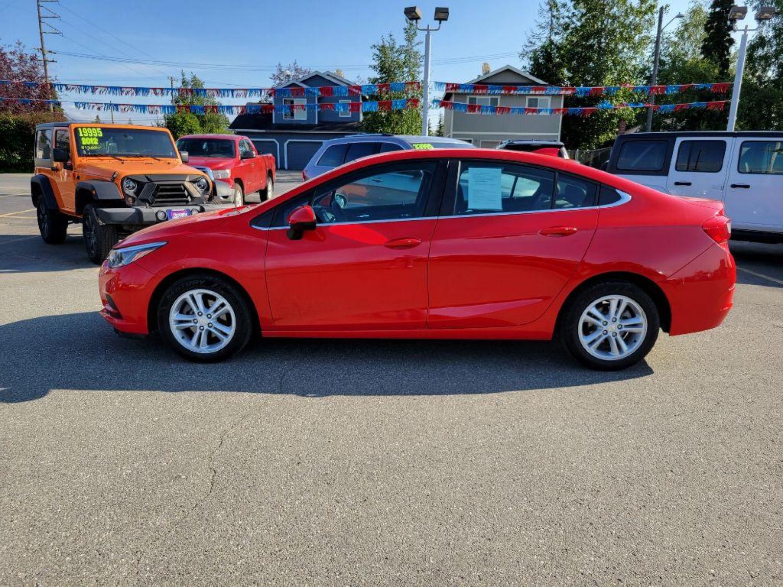 2018 RED CHEVROLET CRUZE LT (1G1BE5SM9J7) with an 1.4L engine, Automatic transmission, located at 929 East 8th Ave, Anchorage, AK, 99501, (907) 274-2277, 61.214783, -149.866074 - Photo #1