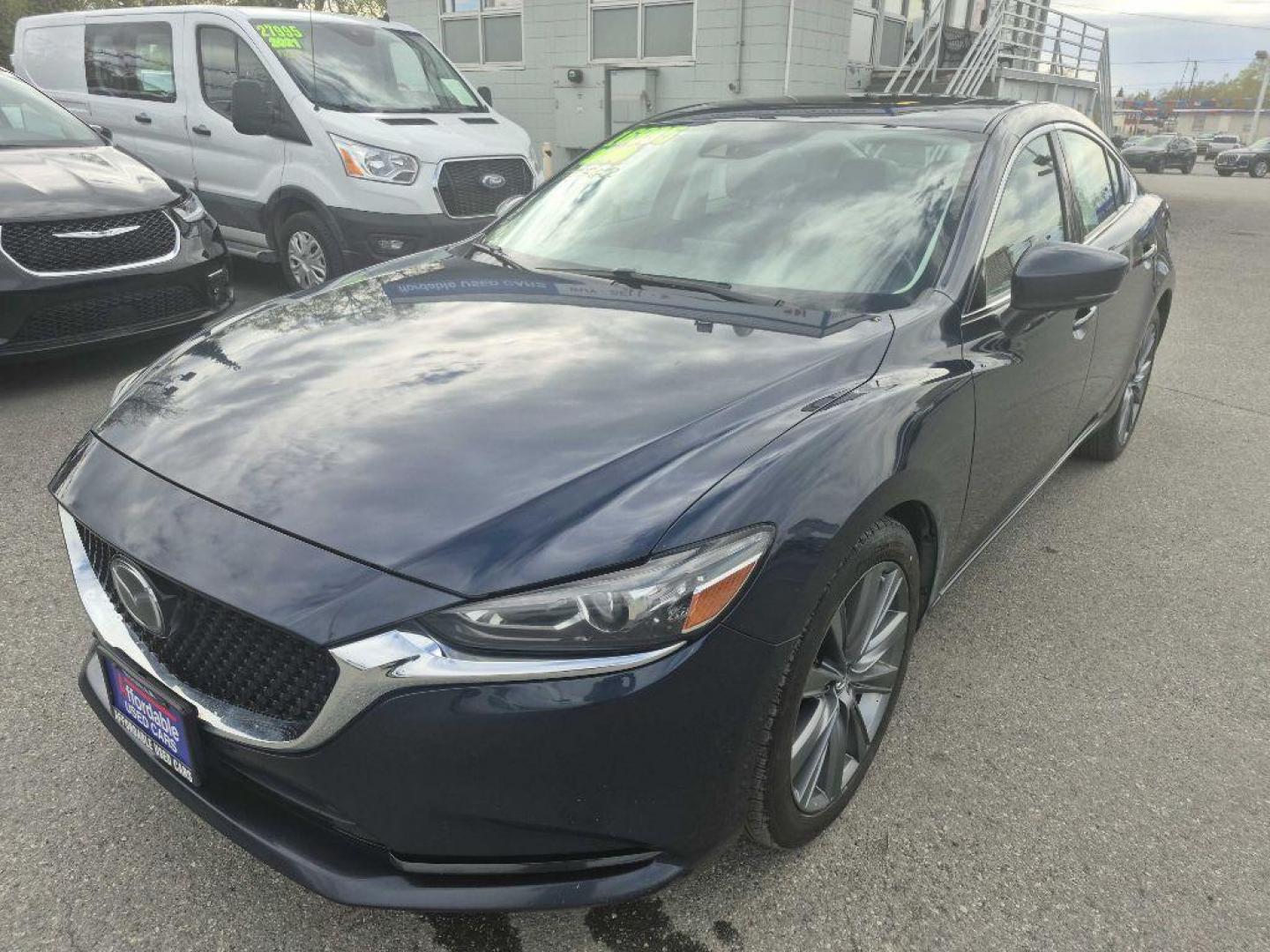 2019 Mazda EZ-6 Touring Auto's photo